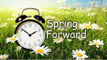 Spring Forward, a clock in the background.